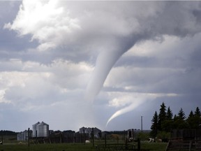 ASQUITH, SASKATCHEWAN - JUNE 15 2012 - Funnel clouds form near Asquith, approximately 40km west of Saskatoon.