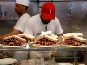 Orders are ready to go out at Katz&#039;s Delicatessen in New York, Thursday, May 11, 2017. The famed New York City restaurant that made a name for itself during World War II with the slogan &quot;send a salami to your boy in the Army,&quot; is launching an expanded global delivery business that will allow people to ship its cured meats around the world. (AP Photo/Seth Wenig)
