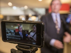 A cell photo records video as Shawn Davidson, Saskatchewan School Boards Association President, speaks to the media in the lobby of the Radisson Hotel in Saskatoon, SK on Thursday, May 4, 2017.