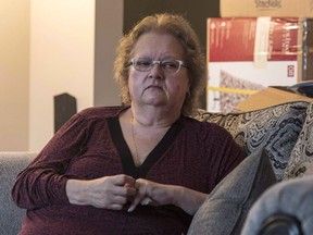 Substitute teacher Charlene Klyne, a La Loche school shooting survivor, sits at her home in Saskatoon, Monday, December 5, 2016. Victims of a deadly school shooting in northern Saskatchewan say they're still not getting the help they need to heal more than 15 months after the tragedy. Charlene Klyne, a substitute teacher who was one of seven people wounded in the January 2016 shooting, says she and the others are worried how they'll pay bills or what their future will be.