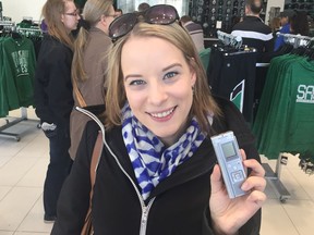 CJME's Arielle Zerr displays Rob Vanstone's digital recorder — the instrument that she instantly repaired after its owner was simply clueless.