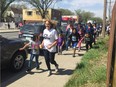 Children from North Central take part in the annual Community/Family Run Running Against Crime Prevention Initiative and Ivan Amichand Memorial 5 K walk and run on Saturday.  ASHLEY ROBINSON/Regina Leader-Post