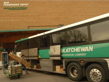 Express service attendant Mark Patron loads STC buses with cargo at the old Regina depot in 2005