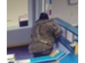 A camera image of an armed robber in Glentworth