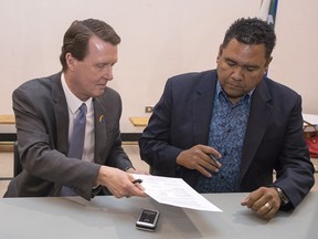 Mayor Michael Fougere, left, signed the protocol for the City of Regina, while Tribal Chief Edmund Bellegarde signed on behalf of the File Hills Qu'Appelle Tribal Council at The Gathered Place in Regina.  The Protocol of Recognition, Partnerships and Respect, which commits the City of Regina and File Hills Qu'Appelle Tribal Council, through the Regina Treaty Status Indian Service Inc to work on joint initiatives that further strengthen their relationship.