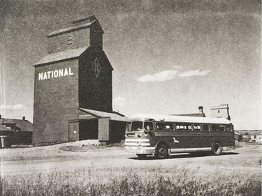 A photo of the Provincial Archives of Saskatchewan Photograph No. 56-109-02, that says "A chartered Saskatchewan Transportation Company bus stands before an elevator in Fort Qu'Appelle, Sask." taken June 1956.