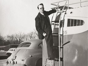 Saskatchewan Archives Board Photograph No. 1069, which says "Premier Douglas standing on ladder on rear of Gov. Bus." It's from 1946, when STC was created.