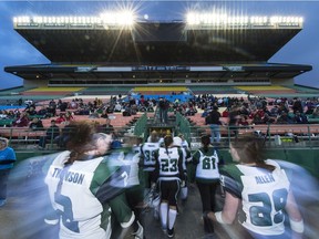 Members of the Saskatoon Valkyries football team head into the Taylor Field tunnel at halftime of Saturday's Western Women's Canadian Football League game against the Regina Riot.