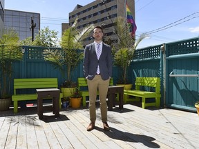 Nathan Markwart, president of the Gay and Lesbian Community of Regina organization, stands on the patio of Q Nightclub on the 2000 block Broad Street in Regina.