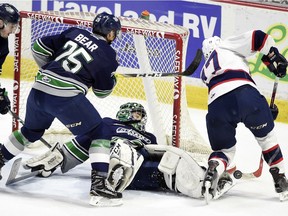 Regina Pats captain Adam Brooks can't quite sneak the puck past Seattle Thunderbirds goalie Carl Stankowski in Game 1 of the WHL final at the Brandt Centre in Regina on Friday.