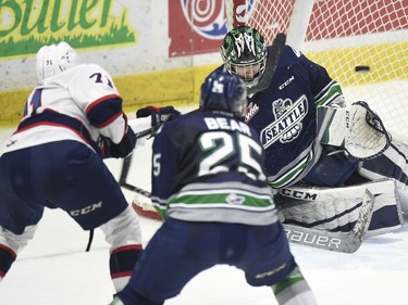 Dawson Leedahl of the Regina Pats fires a shot toward Seattle Thunderbirds Carl Stankowski in Game 2 of the WHL championship series at the Brandt Centre on Saturday.