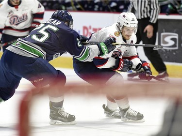 Seattle Thunderbirds Ethan Bear checks Regina Pats Sam Steel in game 2 of the WHL championship series at the Brandt Centre in Regina.