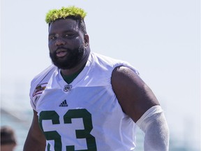 Riders' offensive lineman Dennis Derek is making a statement with his lime-green hair.