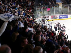 Regina Pats fans celebrate an overtime goal by Adam Brooks in the Eastern Conference final against the Lethbridge Hurricanes.