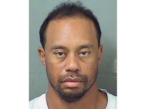This image provided by the Palm Beach County Sheriff's Office on Monday, May 29, 2017, shows Tiger Woods. Police in Florida say Tiger Woods has been arrested for DUI.  The Palm Beach County Sheriff's Office says on its website that the golf great was arrested Monday and booked at about 7 a.m. (Palm Beach County Sheriuff's office via AP) ORG XMIT: NY162