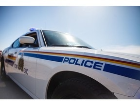 Mikaela MacKenzie/ Calgary Herald CALGARY, AB --MARCH 10, 2015 -- STK RCMP logo and police cars outside of Calgary on Friday, April 10, 2015.   (Mikaela MacKenzie/Calgary Herald) (For  story by )  SLUG: Stock ORG XMIT: POS2015041506542615