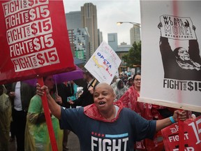 CHICAGO, IL - MAY 23:  Demonstrators fighting for a $15-per-hour minimum wage march through downtown during rush hour on May 23, 2017 in Chicago, Illinois.  The march was held to coincide with McDonald's shareholders meeting which will be held tomorrow in nearby Oak Brook.