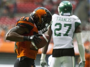 Jeremiah Johnson celebrates one of the B.C. Lions' four touchdown passes on Friday against the Saskatchewan Roughriders.