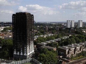The remains of Grenfell Tower stand in London, Saturday, June 17, 2017.