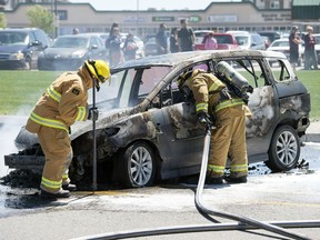 The Regina Fire and Protective Services along with the Regina Police Service were on the scene of a vehicle fire in the middle of Quance Street just  west of University Park Drive in Regina.