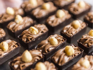 Hazelnut dark chocolates with hazelnuts and pralines.