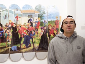 Micheal Langan,  owner of Colonialism Skateboards, stands by a new series of skateboards with art from Canadian artist Kent Monkman that depicts nuns, priests and RCMP officers tearing children away from their families to take them to residential schools. The boards are for sale at the Tiki Room in Regina.
