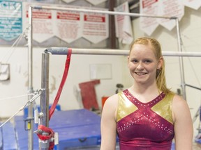 Denelle Pedrick, shown at the Queen City Kinsmen Gymnastics Club, won a national championship earlier this month.
