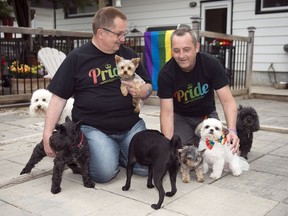 Daryl Fraess, left, and  Richard Reid own Just Us Dogs PetCare in Regina.