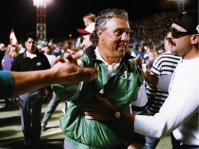 Don Matthews celebrates with Saskatchewan Roughriders fans after a victory over the Sacramento Gold Miners in 1993.