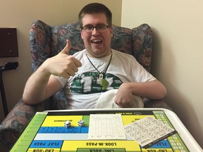 Dylan Earis celebrates a Strat-O-Matic Football victory over a devastated Rob Vanstone.