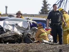 The scene of a fatal two-vehicle crash on Ring Road east of McDonald Street Friday afternoon in Regina March 13, 2015.