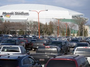 Vehicles fill the lot outside the Brandt Centre near Mosaic Stadium. Some stadium-goers aren't happy about the limited spaces available nearby.