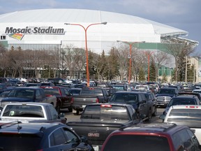 REGINA, SASK : April 28, 2017 - Cars fill the parking lot outside of the Brandt Centre near new Mosaic Stadium. MICHAEL BELL / Regina Leader-Post.