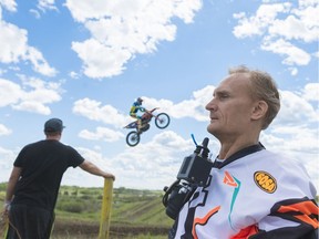 Monte Perepelkin, bottom, at the Moto Valley Raceway in Regina on Saturday. In 1999 at age 30 while motocross racing in Lethbridge, Perepelkin had an accident that left him a quadriplegic. He recently wrote an auto-biography called The Perfect Life.