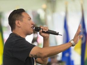 Brad Bellegarde, whose stage name is InfoRed, performs original rap music during National Aboriginal Day celebrations held at Victoria Park.