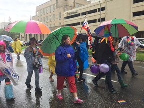 People march in the annual Queen City Pride Parade on Saturday, June 17, 2017.