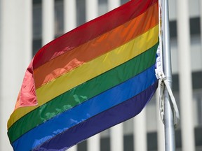 The Rainbow Pride flag was raised at City Hall on Monday in honour of Queen City Pride.