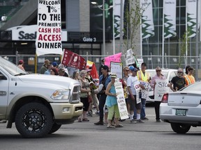A group of approximately 50 protesters were on the corner of 10th Avenue and Elphinstone Street trying to slow down access to the Annual Premier's Dinner being held at the Credit Union EventPlex in Regina.