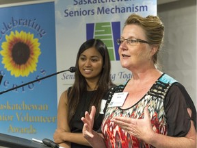 Maureen Klenk, a nurse practitioner, right, and Dr. Trish Hizo-Abes, a palliative care physician, left, raise concerns about the lack of palliative care at a conference on medically assisted death held Thursday in Regina.