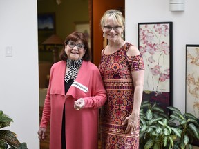 Former Regina real estate mogul Frances Olson, left, and Cyndie Knorr at Olson's  home in Regina.  Knorr made a documentary on former Regina real estate mogul Frances Olson called "Up the Ladder in High Heals".