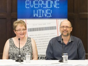 Rhonda and Dennis Clark of Hudson Bay, Sask. smile during a press conference where it was announced the couple won $2 million through Saskatchewan Lotteries.