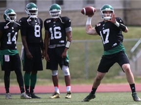 Bryan Bennett, 17, Brandon Bridge, 16, and Marquise Williams, 14, will have more reps in Saturday's pre-season game with Vince Young, 8, on the sideline.