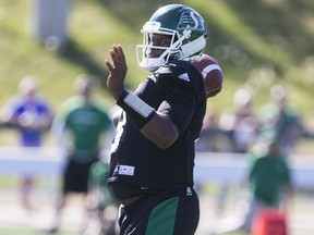 Riders quarterback Vince Young throws the ball during Saturday's mock game.