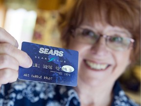 Carole Boldt holds her Sears credit card, one that she has had since 1979.