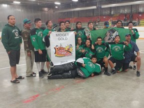 The Standing Buffalo Fighting Sioux celebrate the midget title at the "Lax to the Max" lacrosse tournament in Medicine Hat on the weekend.