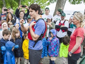 Prime Minister Justin Trudeau arrives at Queen's Royal Park in Niagara-on-the-Lake, Ont., on June 5, 2017, joined by Minister for Environment and Climate Change Catherine McKenna. They were promoting World Environment Day.