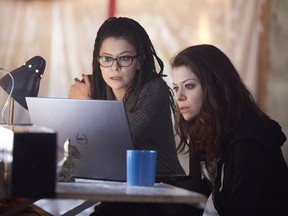 Tatiana Maslany played a plethora of characters in Orphan Black. In this scene from Season 5, she's portraying Cosima (left) and Sarah.