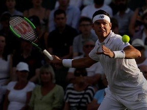 Canada&#039;s Milos Raonic returns to Germany&#039;s Alexander Zverev during their Men&#039;s Singles Match on day seven at the Wimbledon Tennis Championships in London Monday, July 10, 2017. (AP Photo/Alastair Grant)