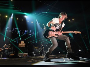 Keith Urban, shown here performing at the 2016 iHeartCountry Festival, was the Sunday night headliner at Country Thunder Saskatchewan.