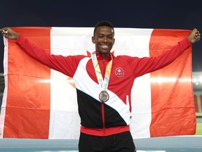 Regina's Vaughn Taylor celebrates a silver medal at the Commonwealth Youth Games on Friday.